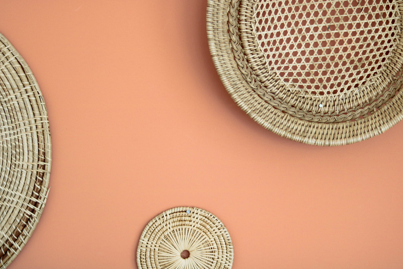 rattan-baskets-wall-terracotta